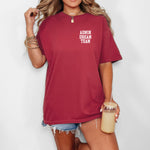 Person wearing a Chili t-shirt, featuring a minimalist white text design on the left chest that reads "ADMIN DREAM TEAM." Perfect for school staff, office teams, or administrative professionals showing team spirit in a stylish and understated way.