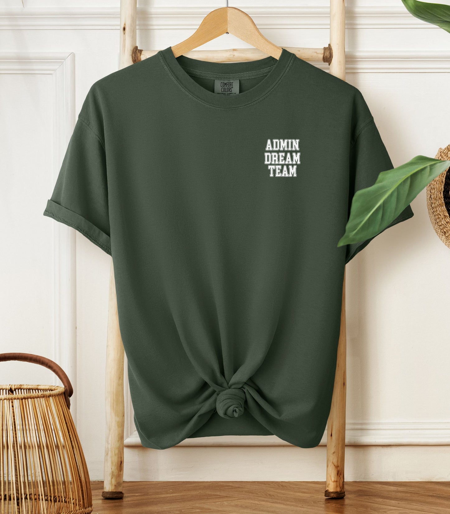 A Hemp color t-shirt, featuring a minimalist white text design on the left chest that reads "ADMIN DREAM TEAM." Perfect for school staff, office teams, or administrative professionals showing team spirit in a stylish and understated way.