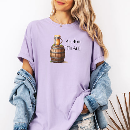 Orchid T-shirt with a Renaissance Faire-inspired design featuring a wooden ale barrel topped with a frothy mug of beer and the phrase “All Hail The Ale!” in medieval-style lettering. A fun and festive shirt perfect for fair lovers, pub crawls, and anyone who enjoys the lively spirit of ale and medieval celebrations.