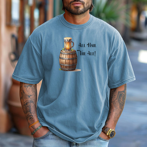 Washed Denim T-shirt with a Renaissance Faire-inspired design featuring a wooden ale barrel topped with a frothy mug of beer and the phrase “All Hail The Ale!” in medieval-style lettering. A fun and festive shirt perfect for fair lovers, pub crawls, and anyone who enjoys the lively spirit of ale and medieval celebrations.