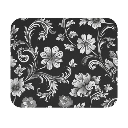 Floral pattern with black and white flowers on a black background