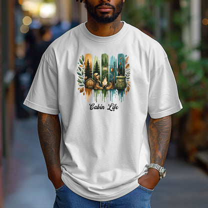 Person wearing a classic white T-shirt with a “Cabin Life” design featuring a colorful, watercolor-style vertical stripe background in earthy tones. The artwork includes pine trees, a log cabin, a campfire with boots, a lantern, and a backpack framed by autumn leaves. A rustic, outdoorsy design perfect for nature lovers, campers, and cabin getaways.