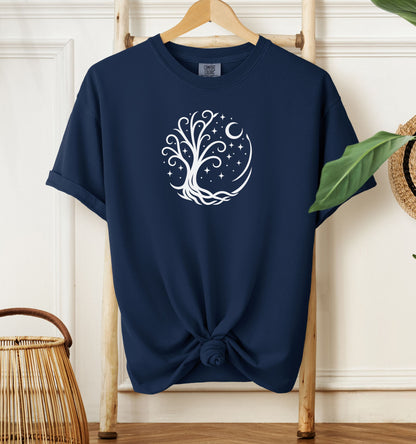 Celestial Tree of Life T-shirt featuring a white mystical tree design within a circular frame of stars, crescent moon, and swirling roots. Printed on a true navy unisex Comfort Colors tee, this nature-inspired celestial design is perfect for free spirits, stargazers, boho style lovers, and anyone drawn to cosmic, spiritual, or magical themes.