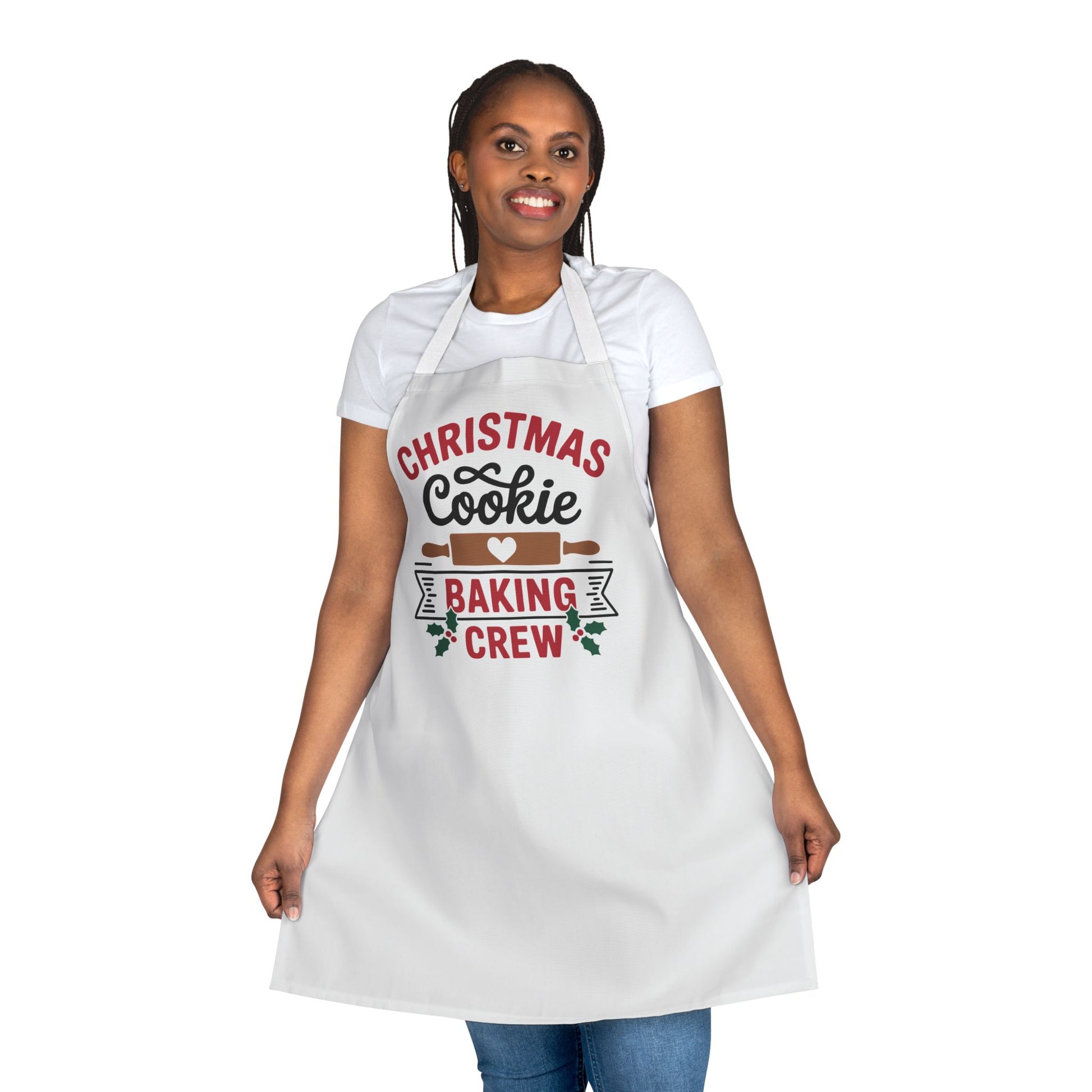 White apron with festive text reading “Christmas Cookie Baking Crew,” featuring rolling pins and holiday accents, perfect for baking and holiday kitchens.