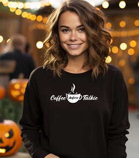 Black Gildan sweatshirt with a centered white graphic of a steaming coffee cup and stylish text reading “Coffee before Talkie.” The playful design humorously declares the need for caffeine before conversation—perfect for coffee lovers who enjoy cozy comfort and a touch of sass in their morning routine.