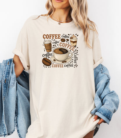 Ivory t-shirt featuring a playful coffee-themed design with multiple illustrated coffee cups, beans, and the word “coffee” repeated in various fonts and styles. Centered around a steaming cup of coffee on a saucer, this fun and cozy graphic is perfect for caffeine lovers who want to show off their coffee obsession in style.