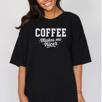 Graphic black t-shirt design featuring bold varsity-style white text “COFFEE” with the phrase “makes me nicer” in a playful script underneath, surrounded by small stars. A fun and relatable design perfect for coffee lovers who know their mood improves with caffeine—ideal for casual wear with a humorous twist.