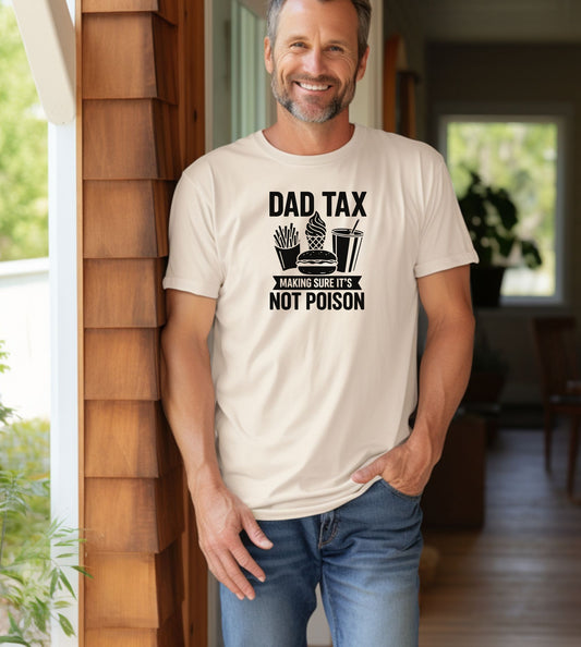 Dad Tax T-shirt featuring the humorous phrase 'Dad Tax – Making Sure It’s Not Poison' with graphics of fries, a burger, ice cream, and a drink. Printed on a classic ivory unisex tee, this playful design is perfect for dads who jokingly 'sample' their kids’ food. Ideal for Father’s Day, casual wear, or gifting to food-loving fathers with a great sense of humor.