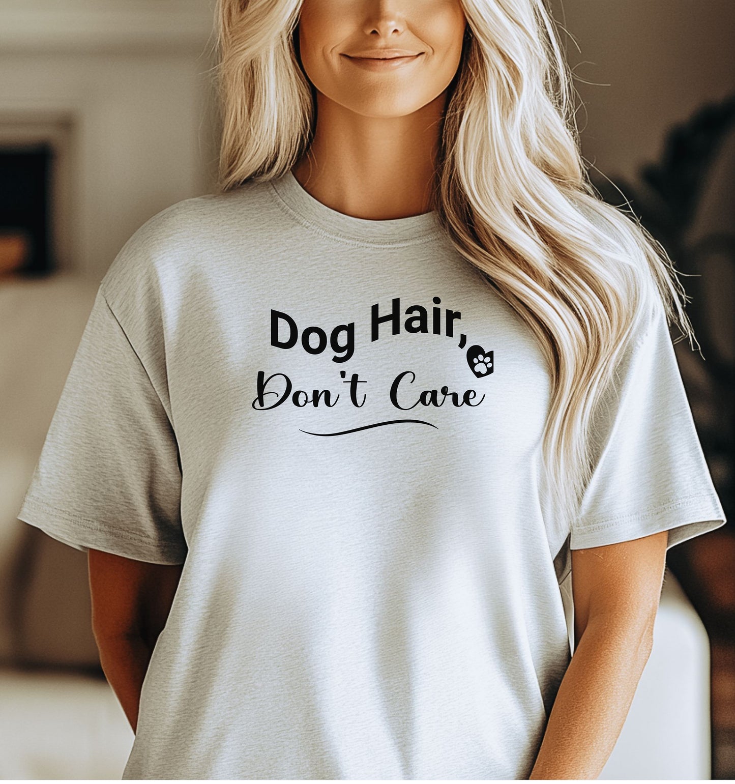 A person wearing an Ash T-shirt with the playful black text “Dog Hair, Don’t Care” and a paw print accent. The design embraces the humor and love of dog ownership, making it a perfect casual fashion statement for pet lovers who proudly accept furry companionship.