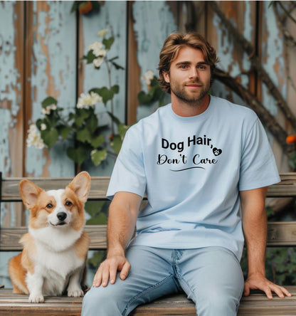 A person wearing a baby blue T-shirt with the playful black text “Dog Hair, Don’t Care” and a paw print accent. The design embraces the humor and love of dog ownership, making it a perfect casual fashion statement for pet lovers who proudly accept furry companionship.