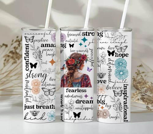 Empowering Motivational Skinny Tumbler – 20 oz featuring an artistic design with a woman adorned in a floral crown on the back and surrounded by uplifting words like strong, fearless, confident, love, believe, and inspirational. Accented with butterflies, bees, and flowers, this reusable stainless steel tumbler is perfect for keeping drinks hot or cold while inspiring positivity and self-confidence every day.