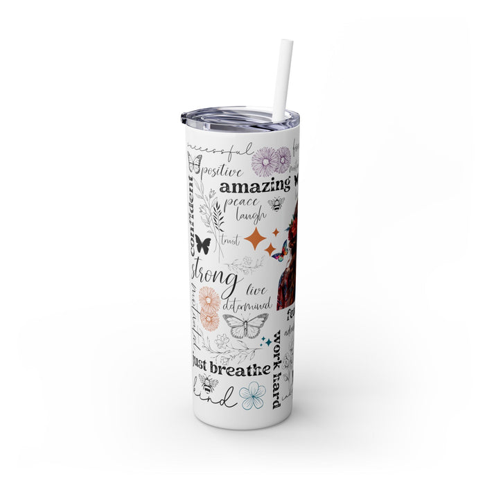 Empowering Motivational Skinny Tumbler – 20 oz featuring an artistic design with a woman adorned in a floral crown on the back and surrounded by uplifting words like strong, fearless, confident, love, believe, and inspirational. Accented with butterflies, bees, and flowers, this reusable stainless steel tumbler is perfect for keeping drinks hot or cold while inspiring positivity and self-confidence every day.