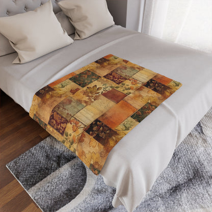 Bed with a fall 30" x40" patchwork quilt laying flat on it.