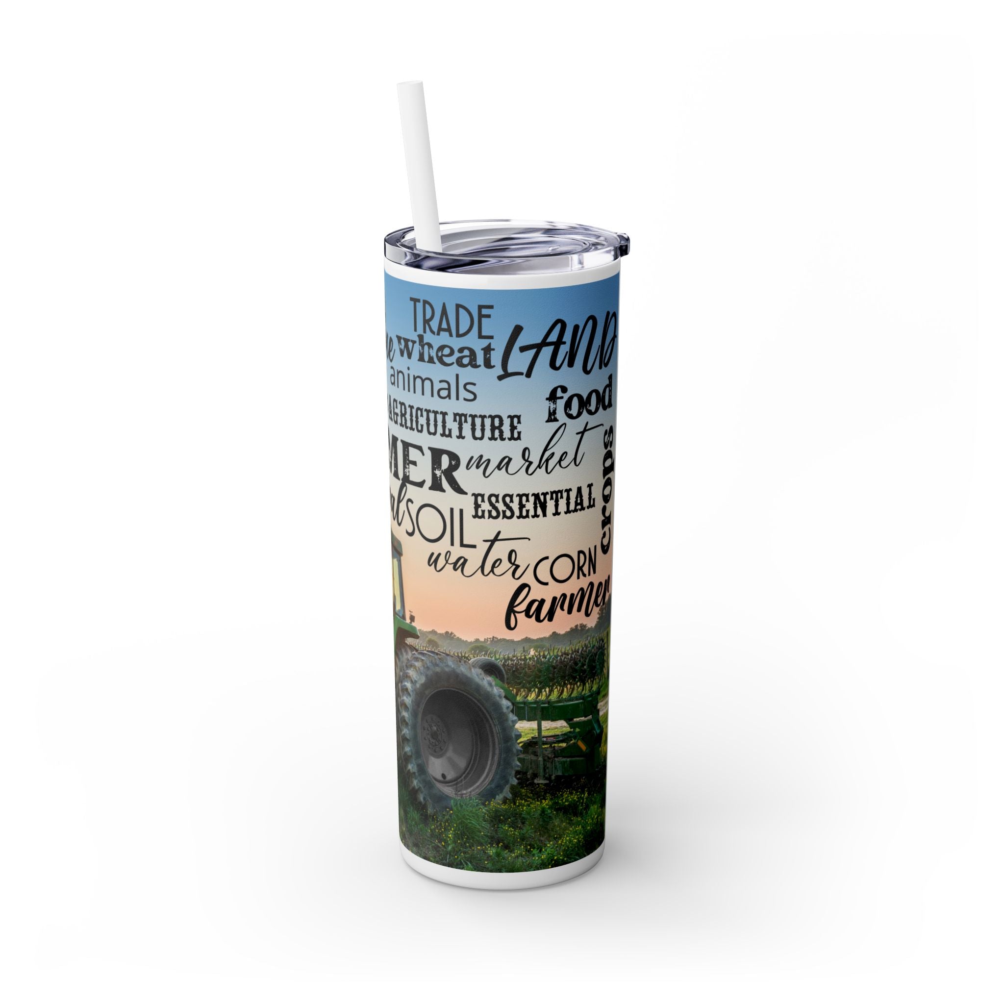 Farm Life Skinny Tumbler – 20 oz featuring a rustic farm scene with a green tractor in a field at sunrise and a background of farming-related words like soil, crops, harvest, land, produce, and hard work. This durable stainless steel tumbler celebrates the farming lifestyle and rural heritage, perfect for keeping drinks hot or cold while honoring agriculture and those who work the land.