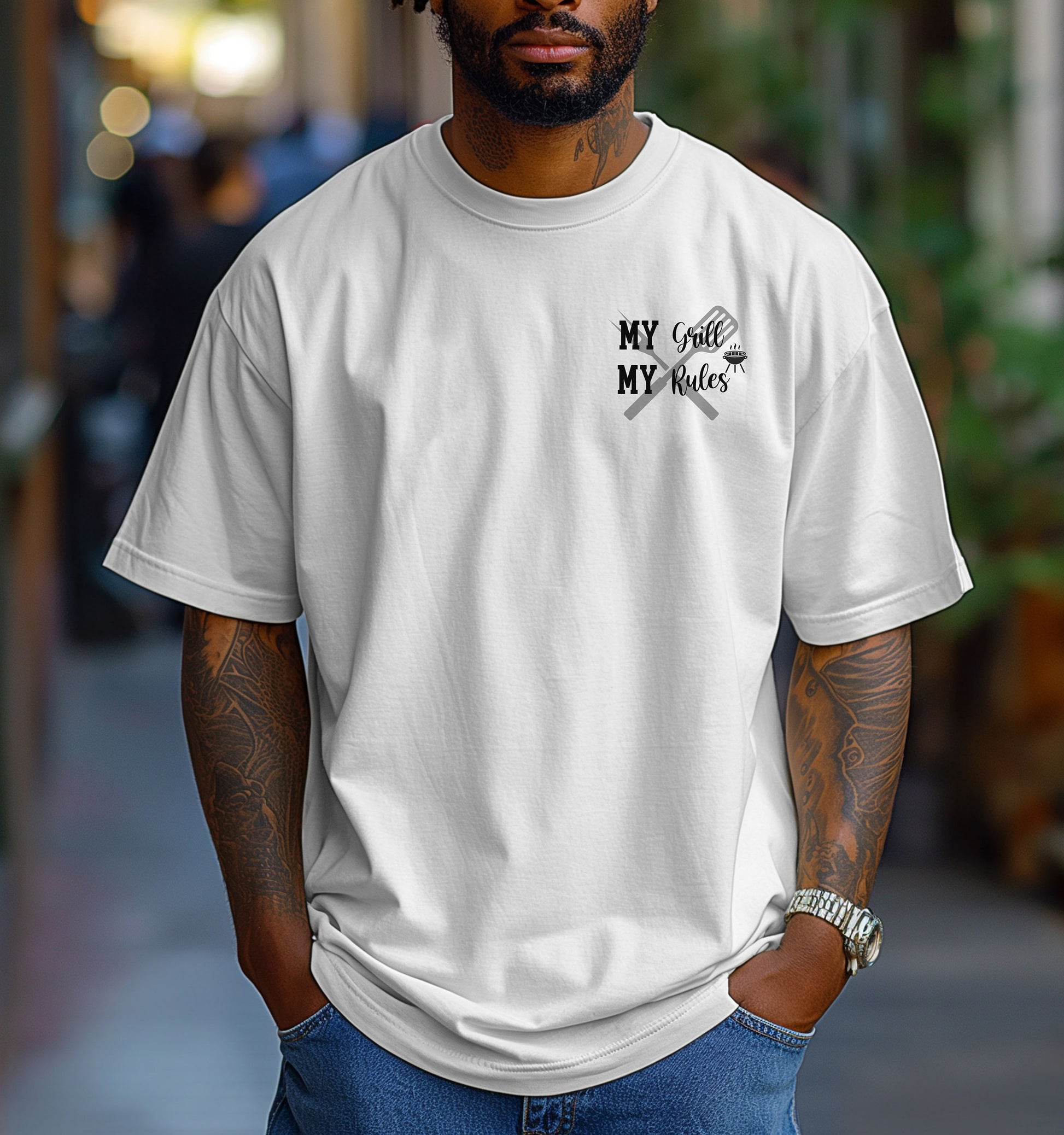 Grill Boss 'My Grill, My Rules' pocket design T-shirt featuring a bold text design with a grilling fork and flame graphic. Printed on a classic white unisex tee, this fun and confident design is perfect for BBQ lovers, pitmasters, and backyard chefs who take charge at the grill. Ideal for summer cookouts, Father’s Day, or casual everyday wear.