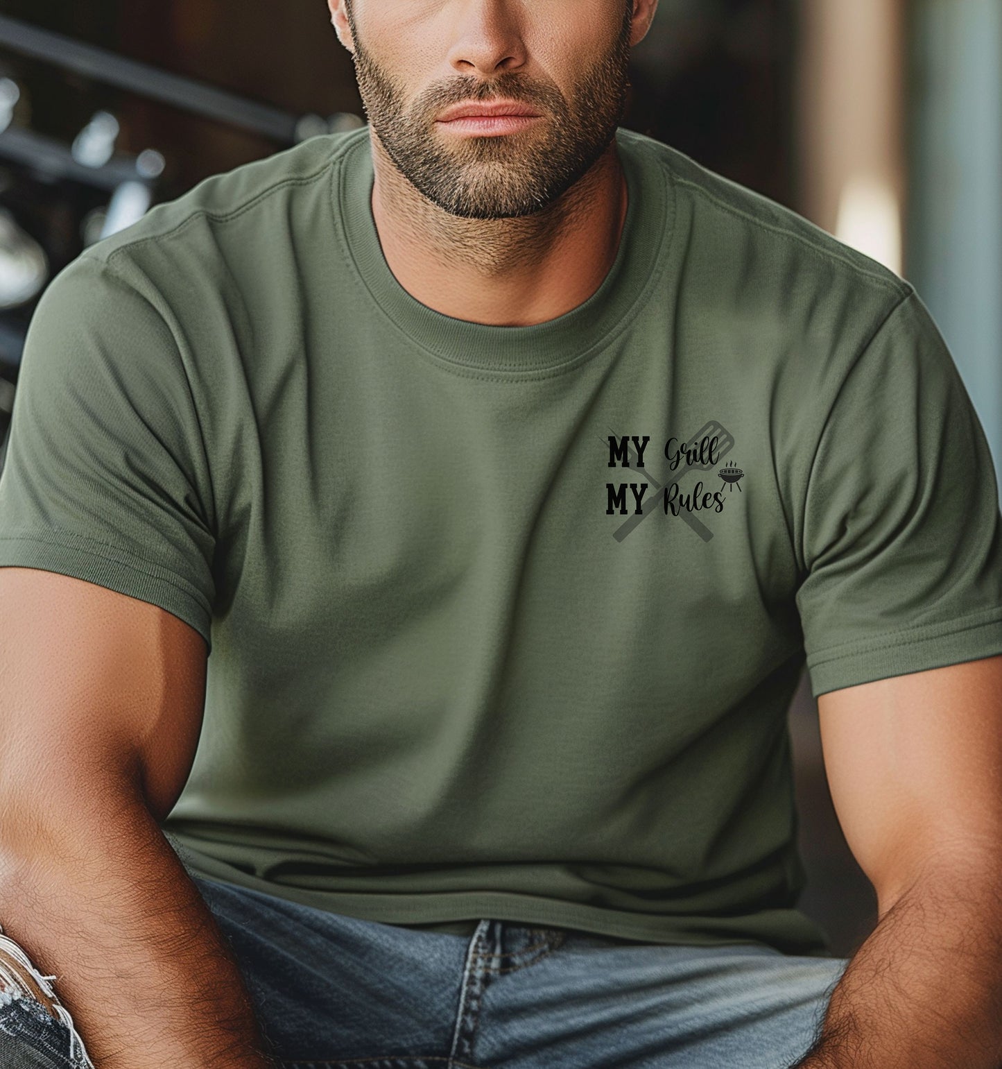 Grill Boss 'My Grill, My Rules' pocket design T-shirt featuring a bold text design with a grilling fork and flame graphic. Printed on a moss unisex tee, this fun and confident design is perfect for BBQ lovers, pitmasters, and backyard chefs who take charge at the grill. Ideal for summer cookouts, Father’s Day, or casual everyday wear.