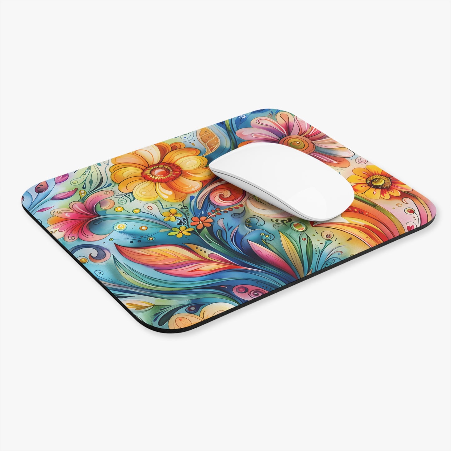 Colorful floral mouse pad with a white mouse on a white background