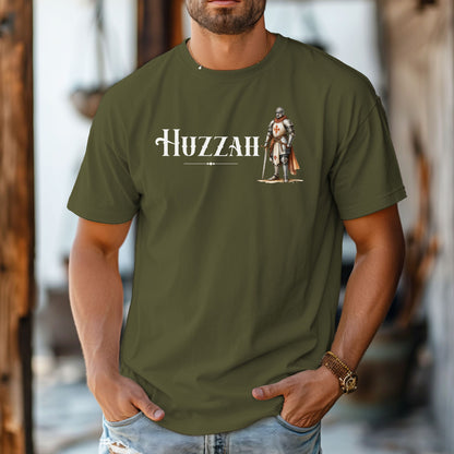 Hemp T-shirt featuring a Renaissance Faire design with the word “Huzzah” in medieval-style lettering and an illustration of a knight in shining armor. Perfect for Renaissance fair goers, medieval enthusiasts, and fans of historical festivals, celebrating the lively and spirited call of “Huzzah” at fairs and events.
