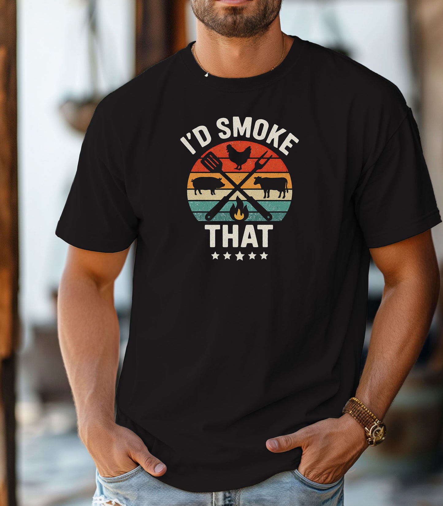 I’d Smoke That T-shirt featuring a retro sunset-style circle graphic with silhouettes of a chicken, pig, and cow, crossed grilling utensils, and a small flame. Text appears above and below the design, accented by five stars at the bottom. Printed on a black unisex tee, this fun BBQ-themed shirt is perfect for grill masters, smoking enthusiasts, and meat lovers who enjoy cooking with humor.