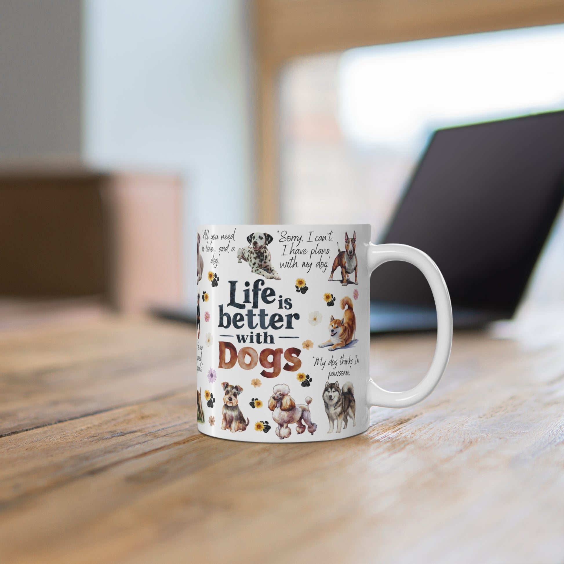 Ceramic Mug with dog-themed design and text on a wooden surface in an ofice