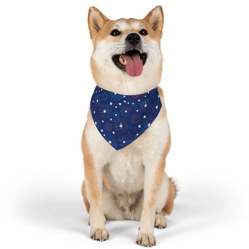 Dog wearing a medium Patriotic Fireworks dog bandana collar with a navy blue background, decorated with red and white starbursts, fireworks, and stars. The festive design celebrates patriotic holidays like the 4th of July, Memorial Day, and Labor Day, making it a stylish accessory for dogs during parades, parties, and summer celebrations.