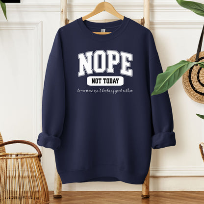 A True Navy sweatshirt with bold white text reading “NOPE NOT TODAY” and smaller script “tomorrow isn’t looking good either,” a humorous casual design for lazy days.
