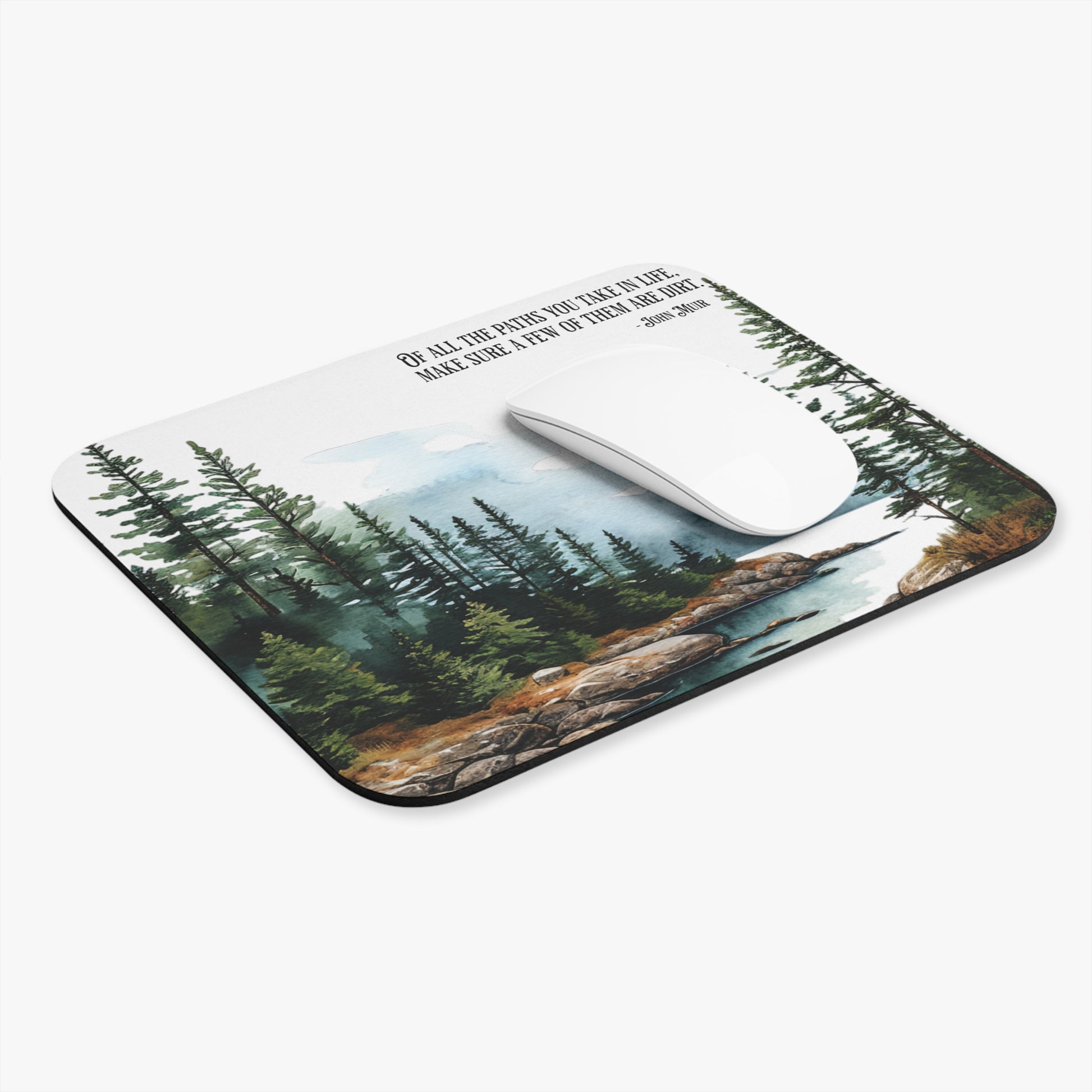 Mouse pad with nature design and motivational quote on a white background