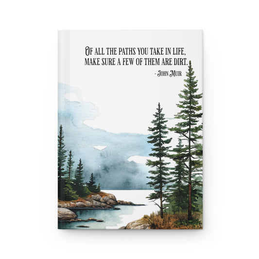 Hardcover journal with a scenic illustration of trees and water, featuring a John Muir quote.