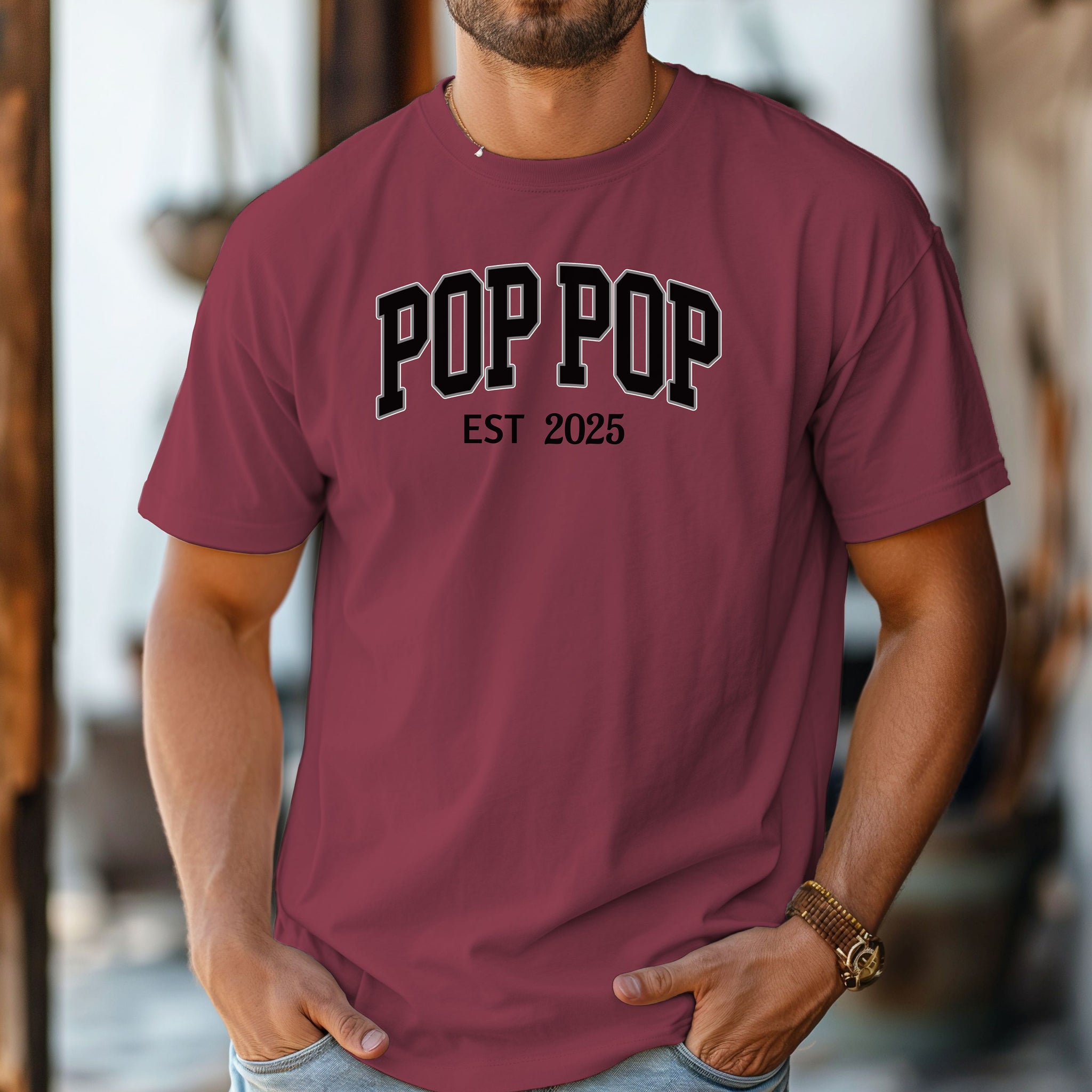 POP POP Est [Year] T-shirt featuring bold varsity-style lettering with a customizable establishment year. Displayed on a soft, chili unisex tee, this casual design is perfect for celebrating a new grandfather or marking a special year. Ideal for Father’s Day, birthdays, or family gatherings, it combines comfort with a proud, personalized statement.