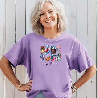 Woman wearing a Violet t-shirt with 4th of July graphics against a light wooden background