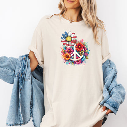 Ivory t-shirt featuring a vibrant retro Peace Love Liberty design with a large white peace sign surrounded by colorful flowers. A daisy with red, white, and blue American flag petals stands out, blending patriotic style with boho hippie vibes. Perfect for 4th of July, festivals, and casual summer wear.