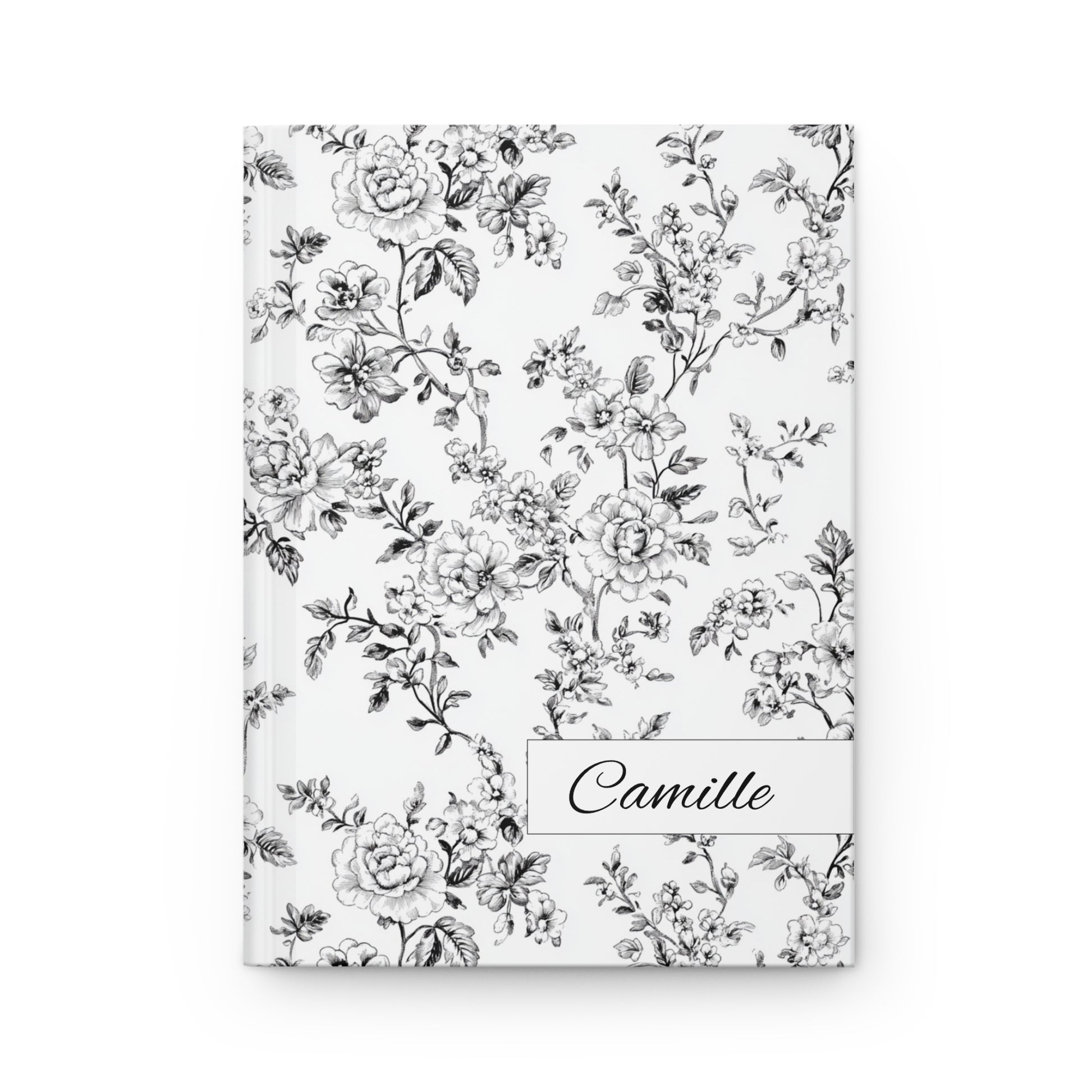 Personalized black toile floral hardcover journal on a white background