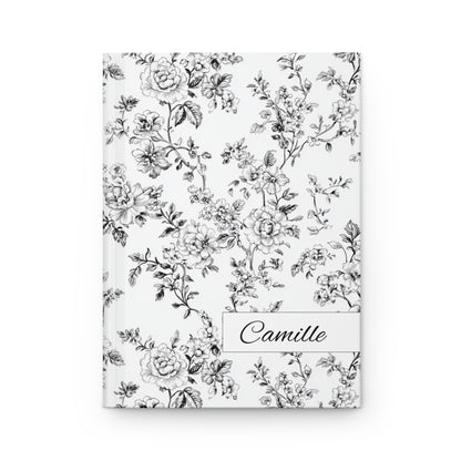 Personalized black toile floral hardcover journal on a white background