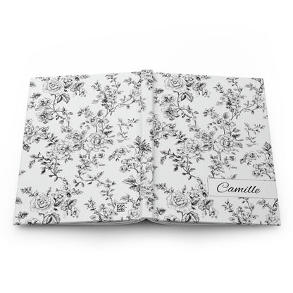 Personalized black toile floral-patterned hardcover journal lying flat showing front and back