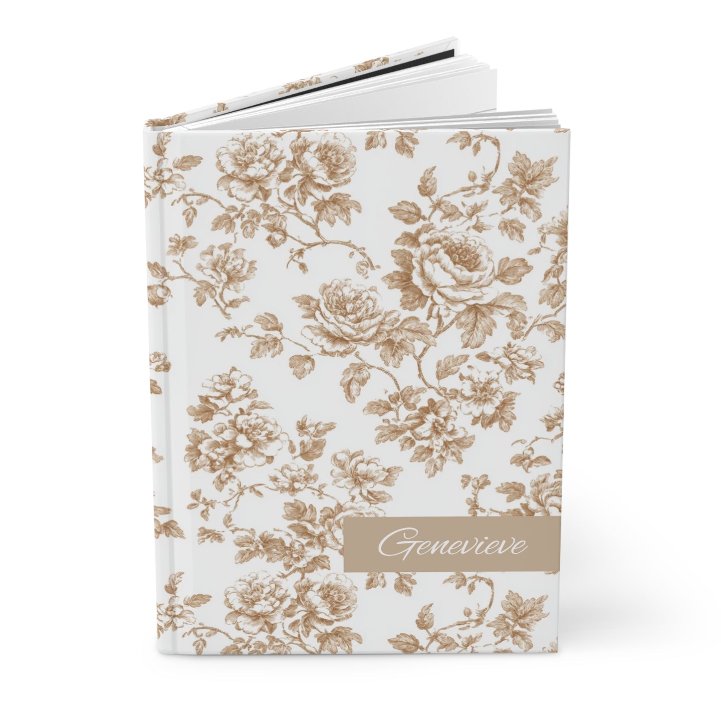 Open champagne floral toile patterned hardcover journal on a white background