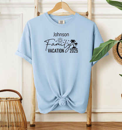 Chambray light blue T-shirt with a customizable “Family Vacation 2025” design featuring a sun, palm trees, and modern script font. Personalized with a family name, this shirt is perfect for coordinating outfits on summer vacations, reunions, or beach trips, creating a fun and memorable matching look for the whole group.