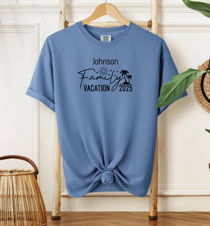 Washed Denim T-shirt with a customizable “Family Vacation 2025” design featuring a sun, palm trees, and modern script font. Personalized with a family name, this shirt is perfect for coordinating outfits on summer vacations, reunions, or beach trips, creating a fun and memorable matching look for the whole group.