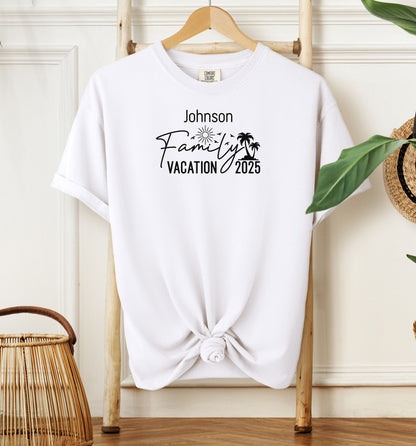 White T-shirt with a customizable “Family Vacation 2025” design featuring a sun, palm trees, and modern script font. Personalized with a family name, this shirt is perfect for coordinating outfits on summer vacations, reunions, or beach trips, creating a fun and memorable matching look for the whole group.