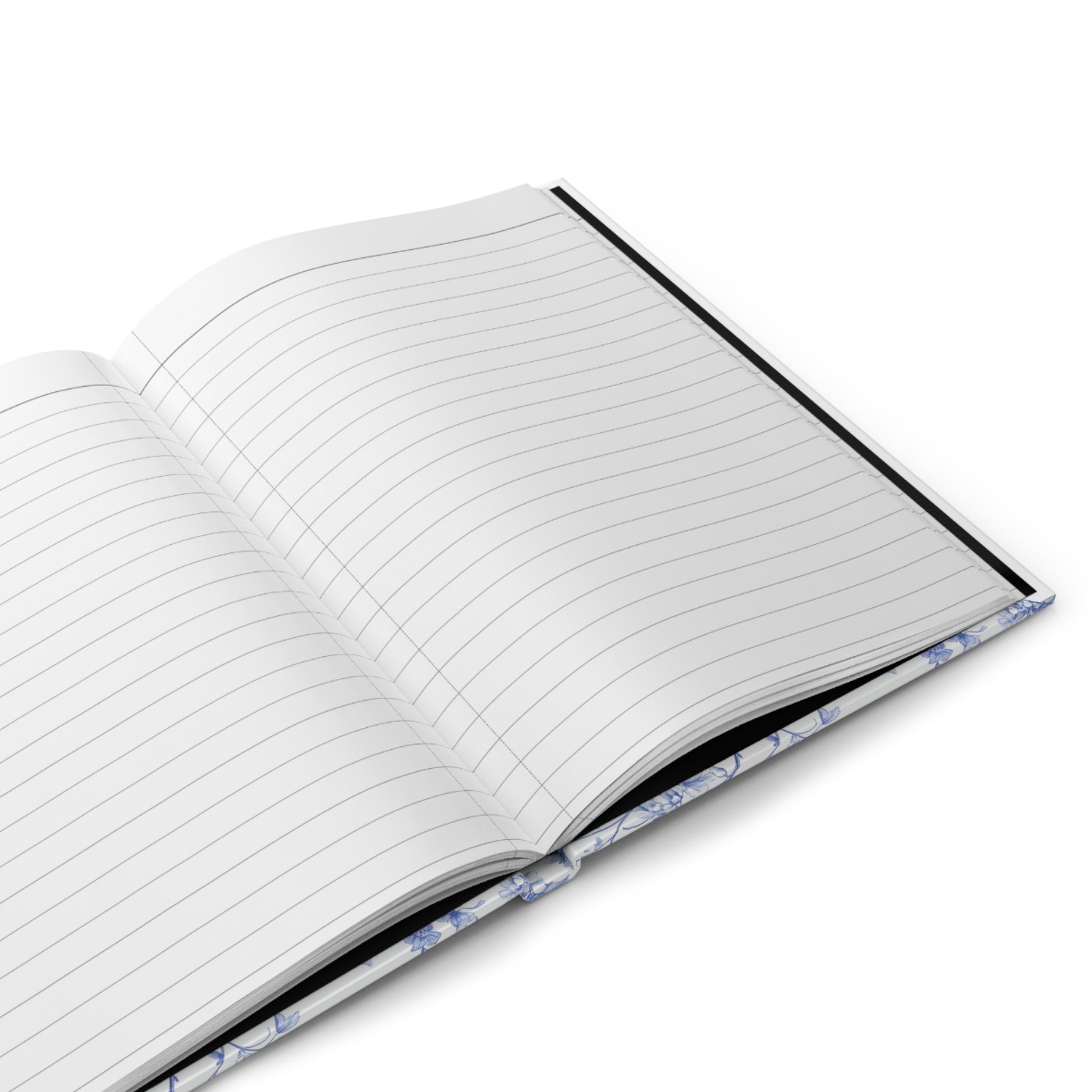 Open hardcover journal with lined pages on a white background