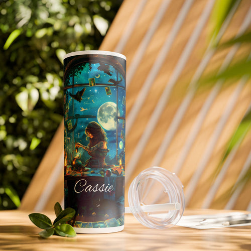 Personalized Moonlight Divination Skinny Tumbler – 20 oz featuring a mystical scene of a woman practicing divination under a glowing full moon with tarot cards floating around her. Surrounded by deep blue night skies, candles, and magical details, this custom tumbler includes a name for a unique touch. Perfect for witchy, celestial, and tarot enthusiasts who love a magical vibe with every sip.