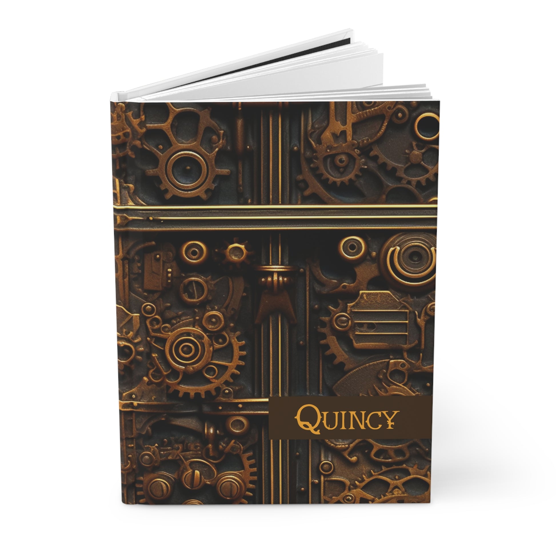 Hardcover journal with steampunk design and 'Quincy' name opened on a white background