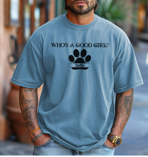 Man wearing a Washed Denim t-shirt that reads “Who’s a Good Girl?” above a black paw print graphic with the name “Stella”. The shirt is a playful and heartwarming tribute to a beloved pet—perfect for dog Dads and puppy lovers.