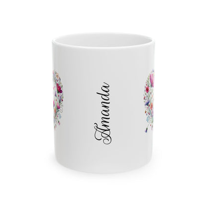 White ceramic mug with floral wildflower boho heart designs on sides and 'Amanda' printed in the front center on a white background