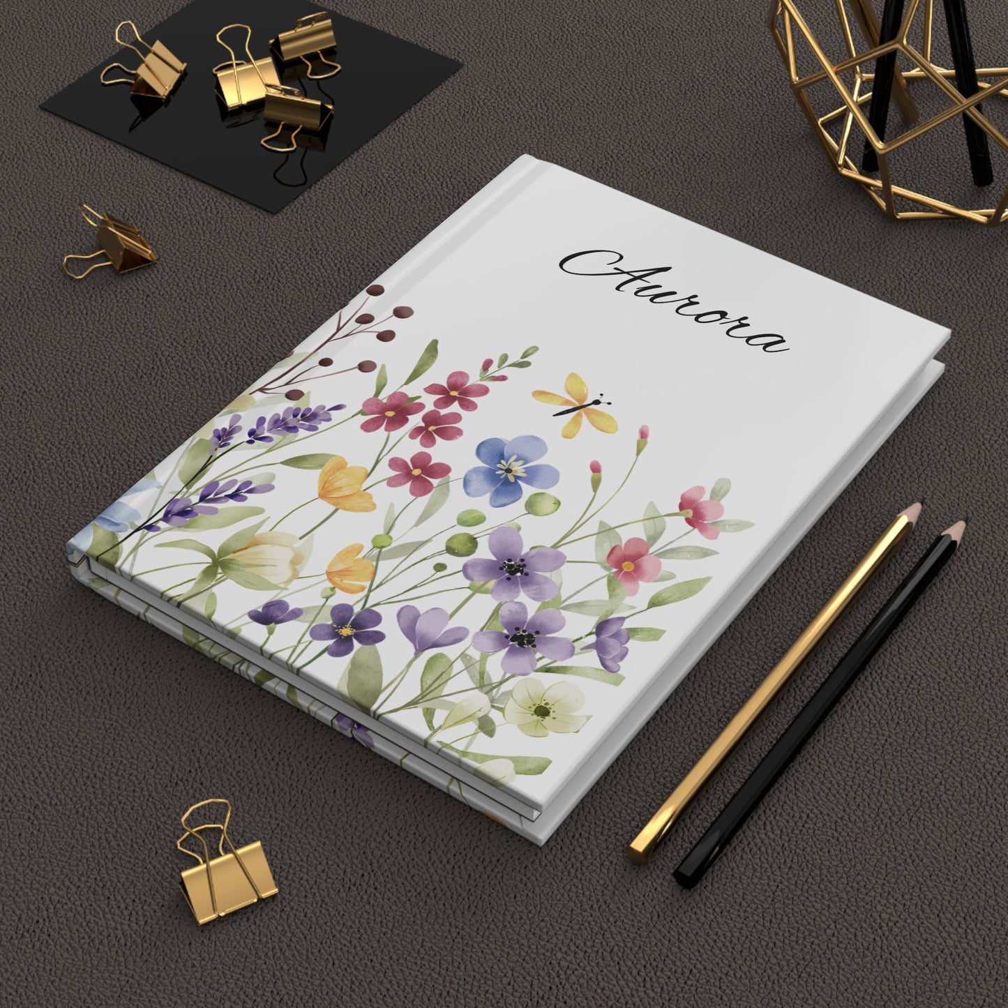 Personalized Wildflower Hardcover Journal with floral design and name sitting in an office setting