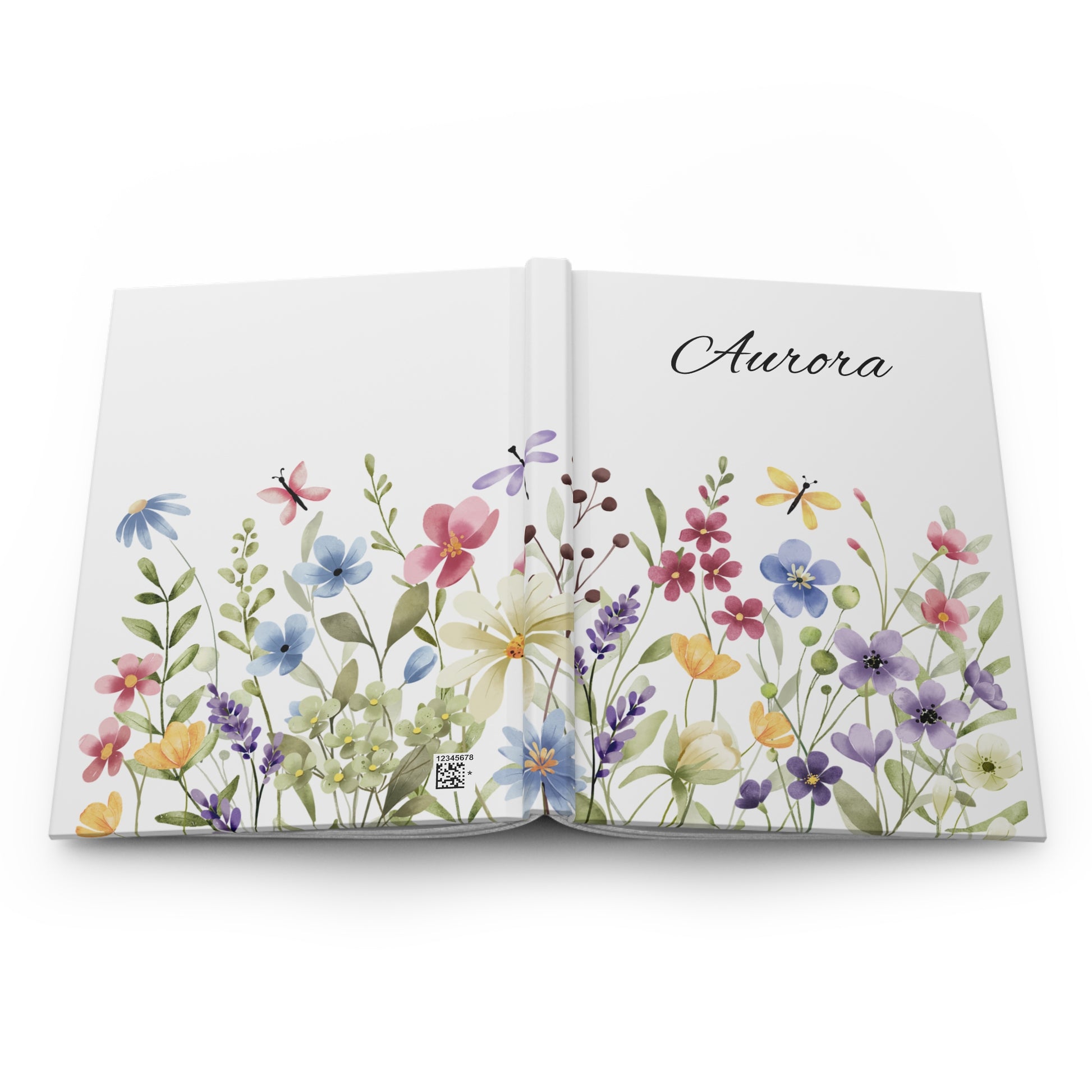 Open book with floral illustrations on a white background lying flat showing the front and back cover