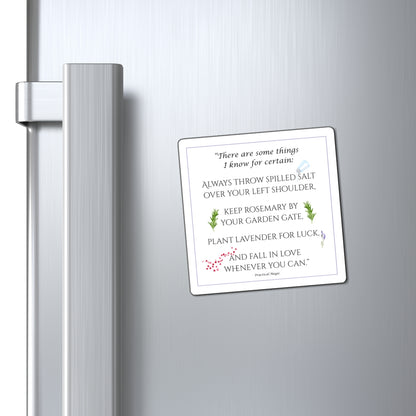 Magnet with practical magic quote and herbs on a white background shown on the front of a stainless steel refrigerator