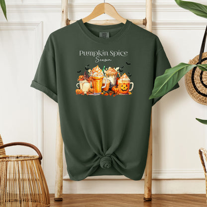 Hemp T-shirt featuring a “Pumpkin Spice Season” design with colorful autumn drinks topped with whipped cream, surrounded by pumpkins, jack-o’-lanterns, fall leaves, and flying bats. The cozy, festive artwork celebrates the love for pumpkin spice and autumn vibes, perfect for seasonal wear and fall enthusiasts.