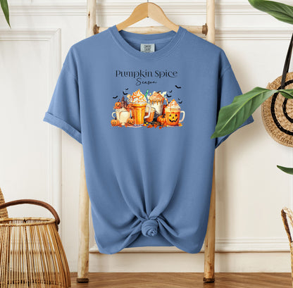 Washed Denim T-shirt featuring a “Pumpkin Spice Season” design with colorful autumn drinks topped with whipped cream, surrounded by pumpkins, jack-o’-lanterns, fall leaves, and flying bats. The cozy, festive artwork celebrates the love for pumpkin spice and autumn vibes, perfect for seasonal wear and fall enthusiasts.
