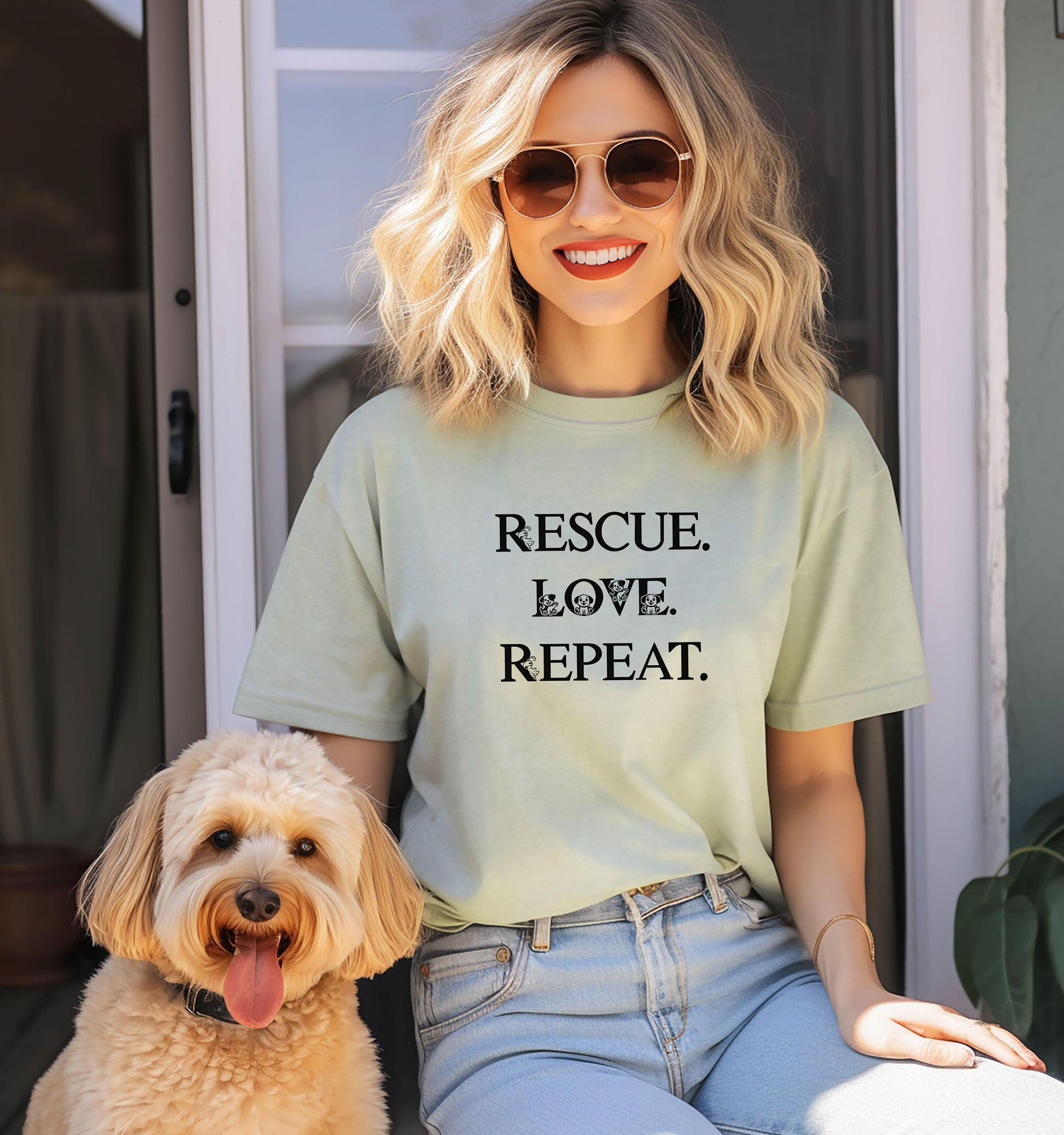 Rescue. Love. Repeat. T-shirt with bold black typography and cute kitten and puppy accents inside the letters. Shown on a bay unisex tee, this design is perfect for animal rescue advocates, pet lovers, and adoption supporters. Ideal for wearing to volunteer events, shelter fundraisers, or everyday outings to show pride in rescuing and loving animals.