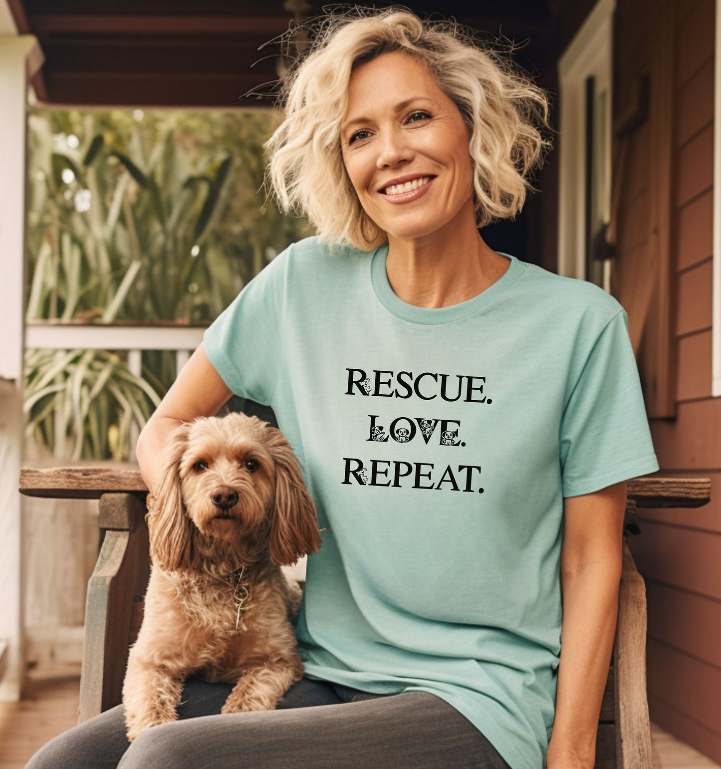 Rescue. Love. Repeat. T-shirt with bold black typography and cute kitten and puppy accents inside the letters. Shown on a chalky mint unisex tee, this design is perfect for animal rescue advocates, pet lovers, and adoption supporters. Ideal for wearing to volunteer events, shelter fundraisers, or everyday outings to show pride in rescuing and loving animals.